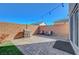 Brick-paved backyard featuring grill and patio furniture for outdoor enjoyment at 7870 Formitch Ct, Las Vegas, NV 89166