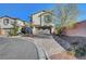 Charming two-story home featuring a two-car garage and nicely landscaped front yard at 7870 Formitch Ct, Las Vegas, NV 89166