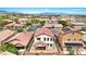 Overhead view of residential area with backyards, patios, and solar panels at 7941 Limestone Arch Ave, Las Vegas, NV 89178