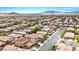 Panoramic aerial view of a well-planned community with mountain backdrop at 7941 Limestone Arch Ave, Las Vegas, NV 89178