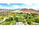 Picturesque landscape showcasing a lush green park with walking trails and desert scenery at 7941 Limestone Arch Ave, Las Vegas, NV 89178