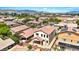 Stunning aerial view shows a home with its red-tiled roof, patio and the surrounding neighborhood at 7941 Limestone Arch Ave, Las Vegas, NV 89178