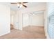 Bright bedroom features carpet, ceiling fan and mirrored closet doors at 7941 Limestone Arch Ave, Las Vegas, NV 89178