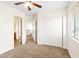 Bright bedroom features a ceiling fan, closet, and window letting in plenty of natural light at 7941 Limestone Arch Ave, Las Vegas, NV 89178