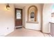 Charming front porch with a decorative fountain and covered entry at 7941 Limestone Arch Ave, Las Vegas, NV 89178