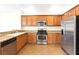 Spacious kitchen with stainless steel appliances, granite countertops, and plenty of storage space at 7941 Limestone Arch Ave, Las Vegas, NV 89178