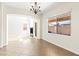 Bright living room with fireplace and large windows at 7941 Limestone Arch Ave, Las Vegas, NV 89178