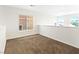 Loft area featuring a window and neutral colored carpet flooring at 7941 Limestone Arch Ave, Las Vegas, NV 89178