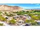 A large playground with a variety of play structures, surrounded by natural desert landscaping at 7941 Limestone Arch Ave, Las Vegas, NV 89178