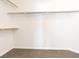 Spacious walk-in closet with ample shelving and neutral carpeting at 7941 Limestone Arch Ave, Las Vegas, NV 89178