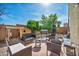 Backyard area featuring patio furniture and a fire pit at 8421 Cheerful Brook Ave, Las Vegas, NV 89143