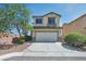 Charming two-story home with a well-manicured lawn and a two-car garage at 8421 Cheerful Brook Ave, Las Vegas, NV 89143