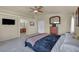 Spacious main bedroom featuring natural light and an ensuite bathroom entrance at 8421 Cheerful Brook Ave, Las Vegas, NV 89143