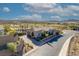 Bird's eye view featuring a residence with manicured landscaping, neighborhood, and mountain backdrop at 91 Alta Cascata Pl, Henderson, NV 89011