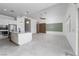 Spacious kitchen with granite island, stainless appliances, and ample cabinet space in an open layout at 91 Alta Cascata Pl, Henderson, NV 89011