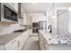 Stylish kitchen features an island, modern appliances, and ample cabinet space at 91 Alta Cascata Pl, Henderson, NV 89011