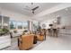 Bright living room with stylish furniture, large windows, and an open floor plan at 91 Alta Cascata Pl, Henderson, NV 89011