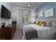 Serene main bedroom boasts modern furnishings, decorative accents, and natural light at 91 Alta Cascata Pl, Henderson, NV 89011