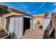 Backyard exterior with two storage sheds and gravel landscaping at 9530 Redstar St, Las Vegas, NV 89123
