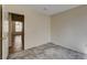 A bedroom showing gray marble-look flooring and the entry door is visible at 9530 Redstar St, Las Vegas, NV 89123