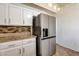 Kitchen featuring stainless steel refrigerator and granite countertops at 9530 Redstar St, Las Vegas, NV 89123