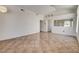Spacious living room with tile flooring, high ceilings, and neutral walls, ready for personalization at 9530 Redstar St, Las Vegas, NV 89123