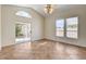 Bright living room with sliding glass doors and tile flooring at 9530 Redstar St, Las Vegas, NV 89123