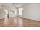 Bright and airy living room with tile floors, vaulted ceilings, and natural light from large windows at 9530 Redstar St, Las Vegas, NV 89123