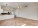 Open floor plan with kitchen and living area connected by tile flooring at 9530 Redstar St, Las Vegas, NV 89123