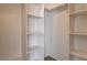 Well-organized walk-in closet with built-in shelving and ample hanging space for optimal storage at 9530 Redstar St, Las Vegas, NV 89123