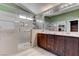 Bathroom featuring a glass shower, dual vanity, and modern fixtures at 9844 Red Horse St, Las Vegas, NV 89143