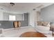 Loft area with hardwood floors, neutral walls, and comfortable sitting area at 9844 Red Horse St, Las Vegas, NV 89143