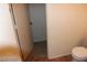 Compact bathroom with toilet and potential access to a walk-in closet at 10021 Via Toro Ave, Las Vegas, NV 89117