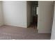 Bright bedroom featuring neutral walls and soft carpeting at 10021 Via Toro Ave, Las Vegas, NV 89117