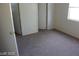 A bright bedroom offers a peaceful retreat with ample natural light and plush carpeting at 10021 Via Toro Ave, Las Vegas, NV 89117
