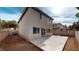 A spacious backyard featuring a concrete patio and block wall at 10245 Missouri Meadows St, Las Vegas, NV 89183
