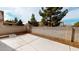 A concrete patio area with a surrounding block wall, offering privacy at 10245 Missouri Meadows St, Las Vegas, NV 89183