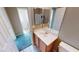 Bathroom featuring a single sink vanity and mirrored medicine cabinet at 10245 Missouri Meadows St, Las Vegas, NV 89183