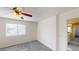 Bright bedroom with plush carpeting, and a ceiling fan at 10245 Missouri Meadows St, Las Vegas, NV 89183