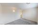 Cozy bedroom with soft carpet and a doorway leading to another room at 10245 Missouri Meadows St, Las Vegas, NV 89183