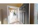 Inviting entryway featuring a black front door and a glimpse of the home's exterior at 10245 Missouri Meadows St, Las Vegas, NV 89183