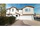 Attractive two-story home featuring a well-manicured front yard and an attached garage at 10245 Missouri Meadows St, Las Vegas, NV 89183