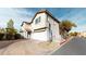 Charming two-story home with a two-car garage and landscaped front yard at 10245 Missouri Meadows St, Las Vegas, NV 89183