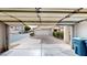 Garage with an open door and view of the front yard and street at 10245 Missouri Meadows St, Las Vegas, NV 89183