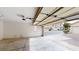 Spacious two-car garage featuring a concrete floor and automatic door opener at 10245 Missouri Meadows St, Las Vegas, NV 89183
