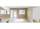 Bright and open living area adjacent to the kitchen with access to outdoor patio at 10245 Missouri Meadows St, Las Vegas, NV 89183