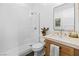 Bright bathroom features a walk-in shower and vanity with white countertops at 10969 Tranquil Waters Ct, Las Vegas, NV 89135