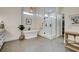 Luxurious bathroom with a freestanding tub, glass-enclosed shower, and modern finishes, providing a serene and upscale ambiance at 10969 Tranquil Waters Ct, Las Vegas, NV 89135