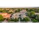 Beautiful single-story home featuring a neutral color palette and meticulously manicured landscaping at 10969 Tranquil Waters Ct, Las Vegas, NV 89135