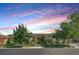 Charming single story home boasts a beautiful landscaped front yard and a covered entry at 10969 Tranquil Waters Ct, Las Vegas, NV 89135